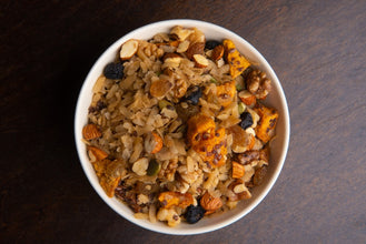 300 g pack of Bakul Phool Brown Rice Muesli – healthy breakfast blend with crunchy brown rice flakes and real dried mango pieces.